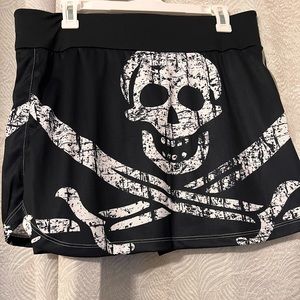 Black skull and crossbones mini skirt with built in shorts